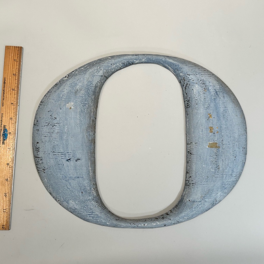Large Antique wooden letter “O” from old restaurant signage